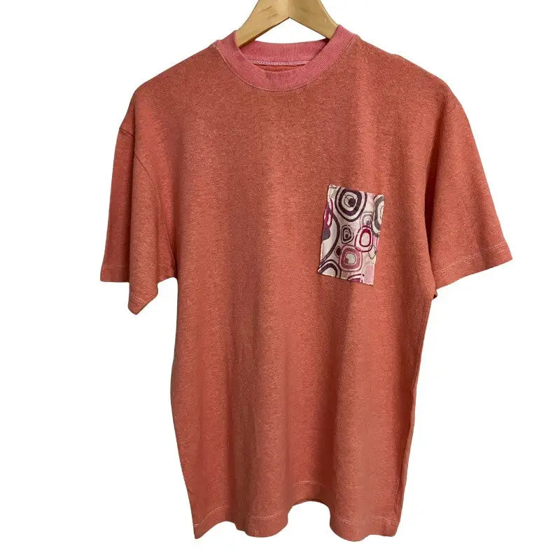 Retro Pocket Tee in salmon pink with concentric circle pocket