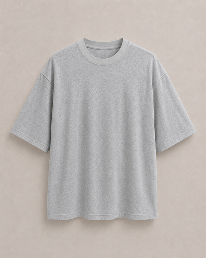 A light gray t-shirt with a relaxed, oversized fit, displayed flat against a neutral beige background. Hemp Horizon