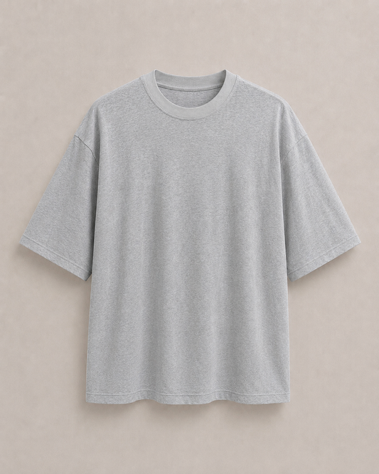 A light gray t-shirt with a relaxed, oversized fit, displayed flat against a neutral beige background. Hemp Horizon