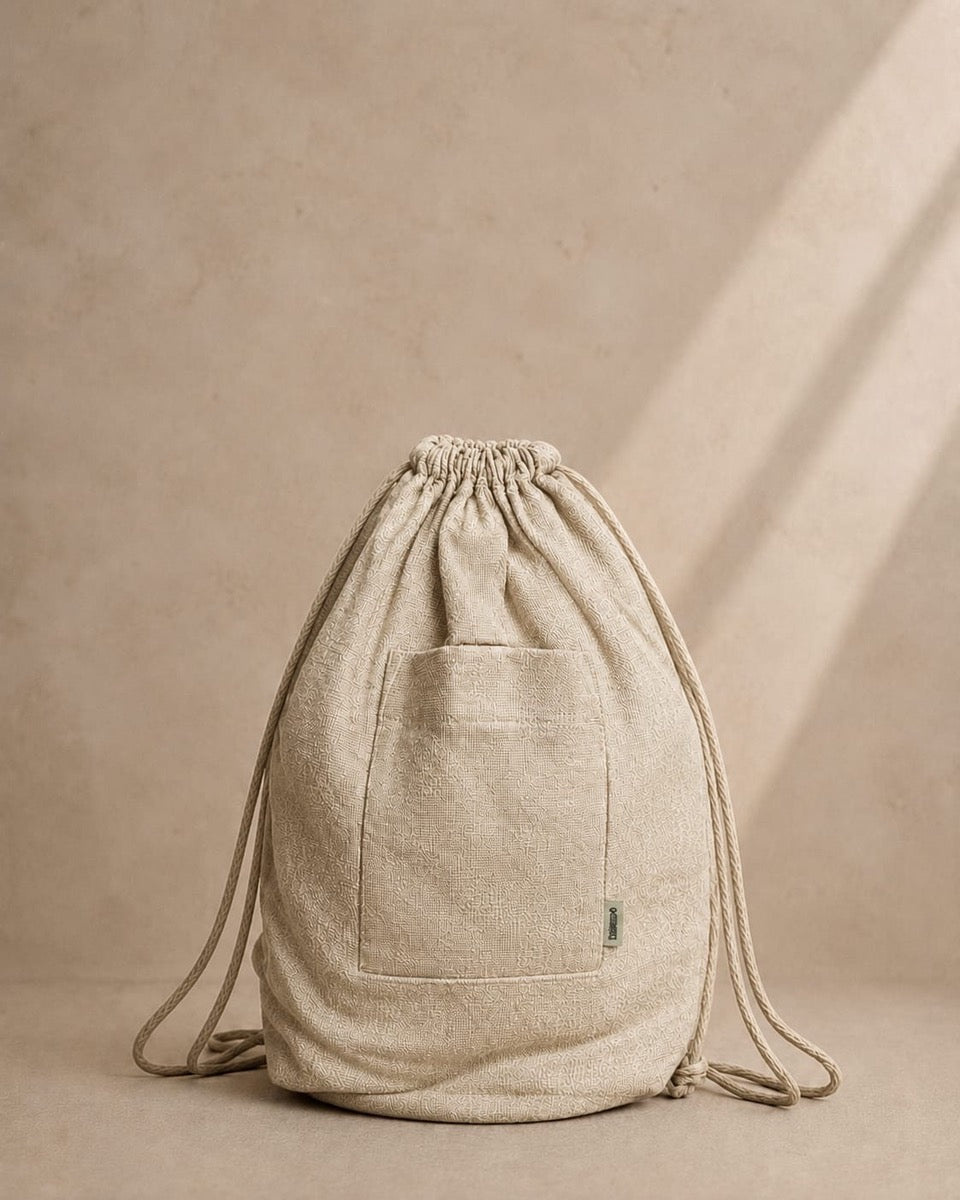 Lanai hemp drawstring bag with pockets.