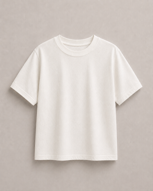 A plain off white pure hemp short-sleeve t-shirt neutral light gray background. Hemp Horizon