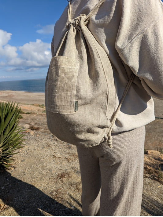 Hemp drawstring bag with pockets.